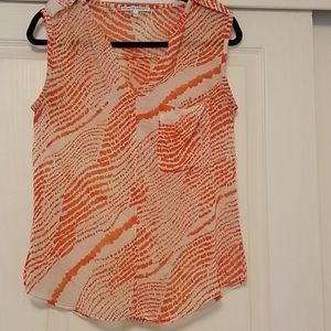 Sheer orange and creme top